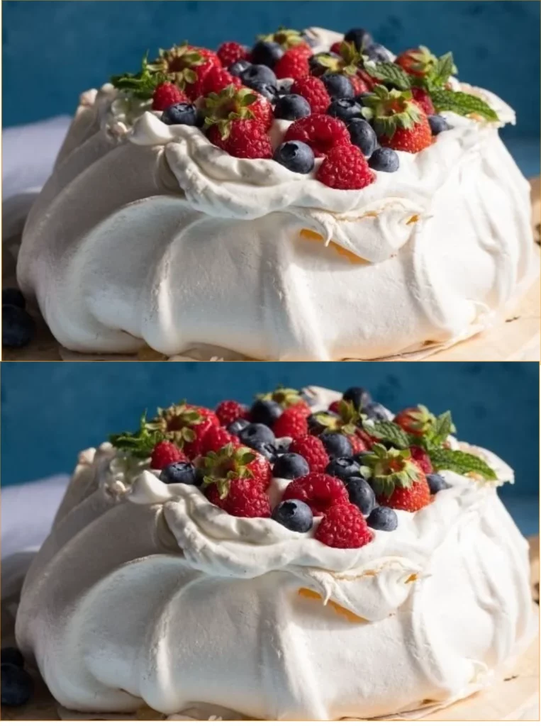 Light and crunchy Pavlova Delight dessert with fresh fruits and whipped cream