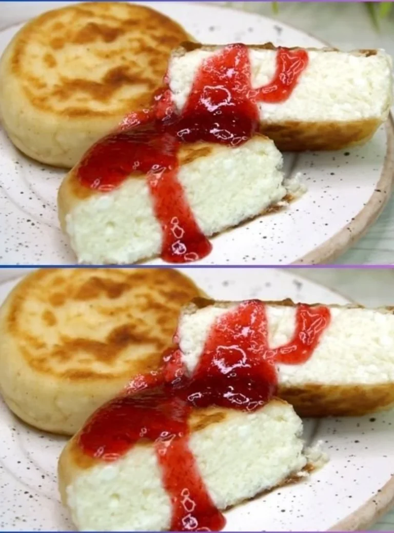 Slice of creamy cheesecake on a plate with fresh berries