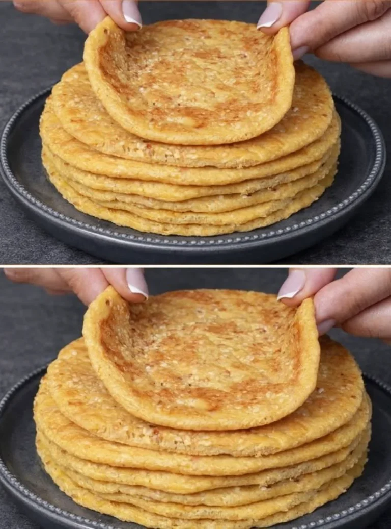 Loaf of fresh sesame bread ready to be sliced for sandwiches or served warm.